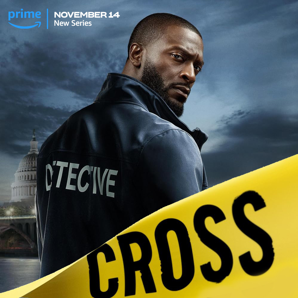 Aldis Hodge turns back to look at the camera in his detective uniform with the show name CROSS sprawled on police tape across the bottom right corner